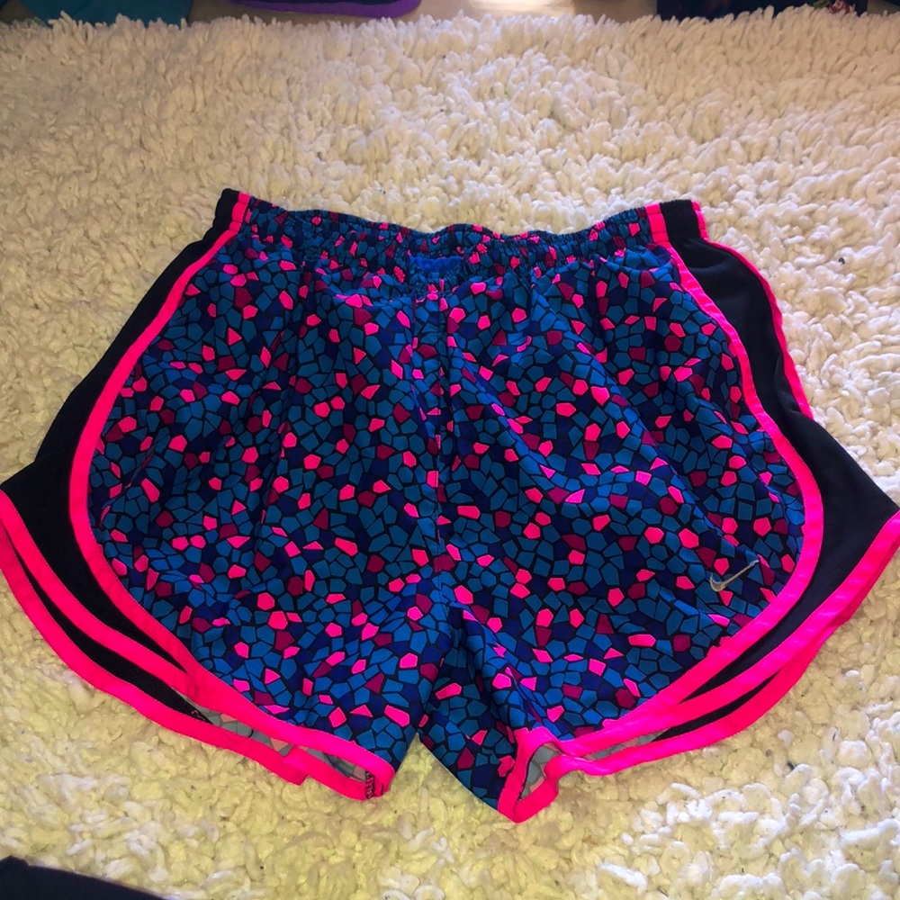 Pink, blue, maroon patterned Nike running shorts